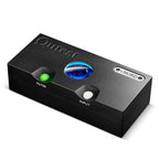 Chord Qutest DAC with black chassis showing glowing blue window and illuminated green and white buttons labeled Filter and Input