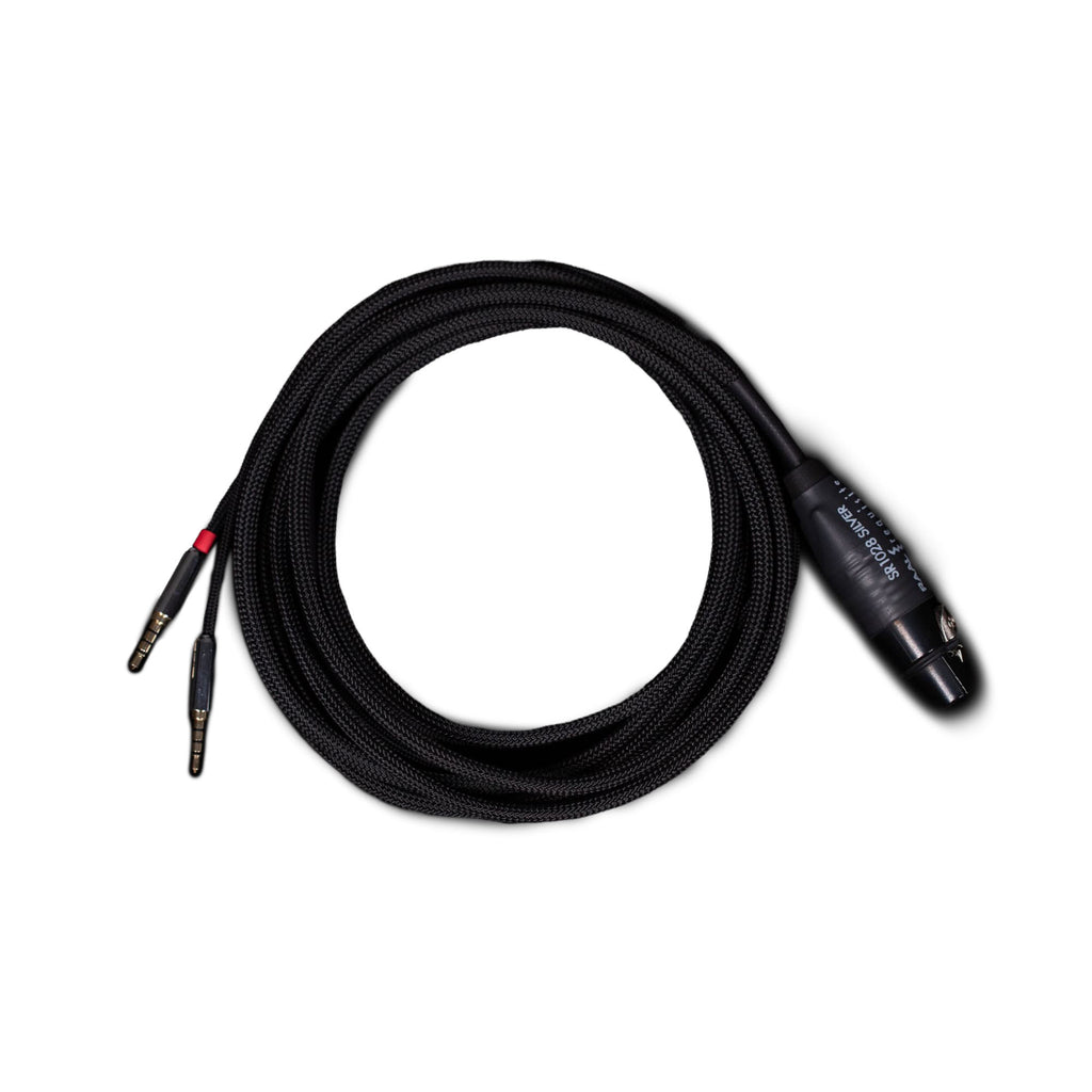 RAAL-requisite Studio Reference Silver Cable for Ribbon Headphones coiled with connectors on white background