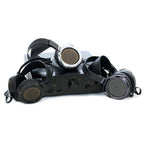 STAX SRM-T8000 electrostatic headphone amplifier with three pairs of electrostatic headphones against white background