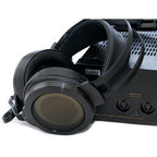 STAX SR-007 MK2 Electrostatic Headphones with black finish resting on matching headphone amplifier on white background