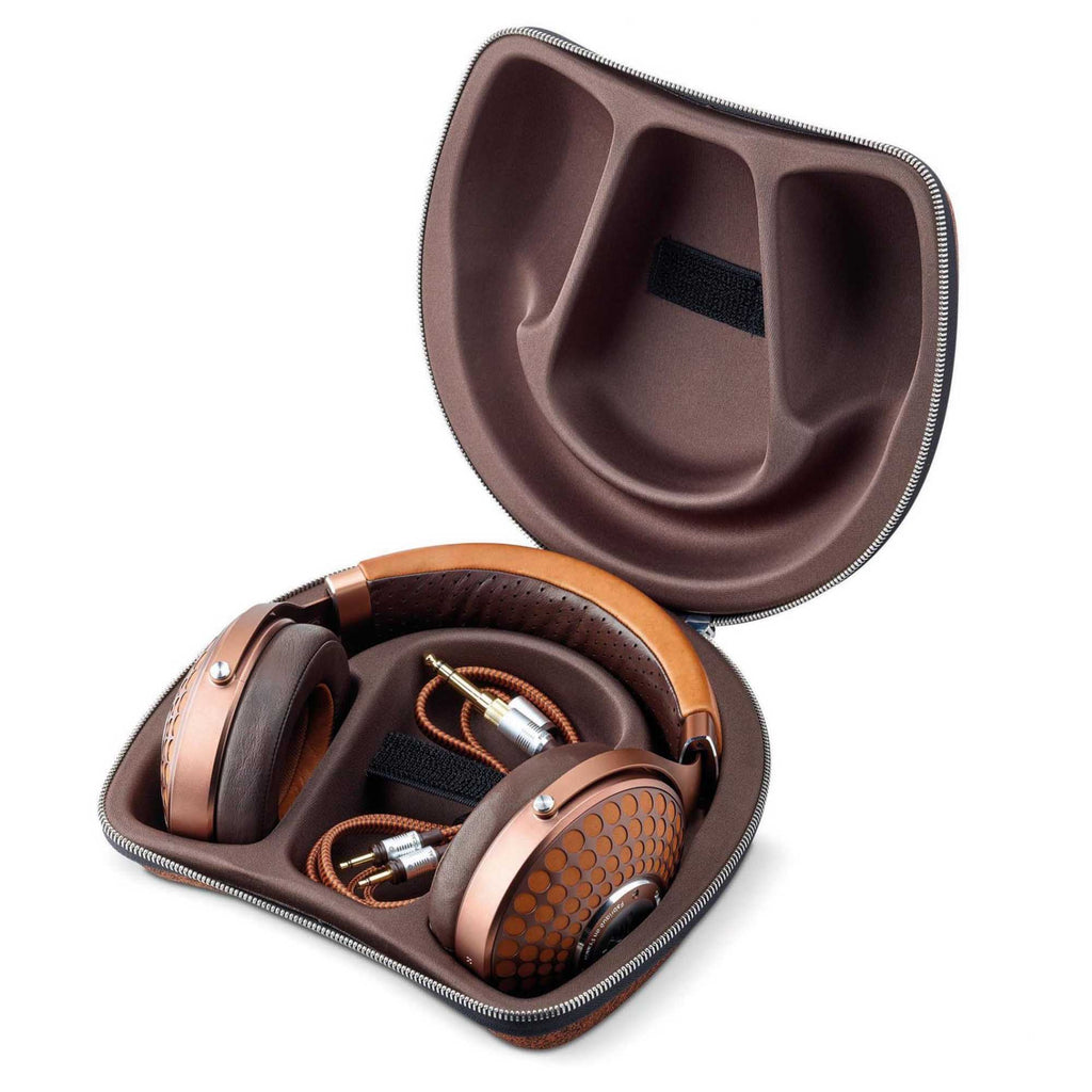 Focal Stellia Closed-Back Dynamic Headphones in brown with protective carrying case and detachable cables on white background