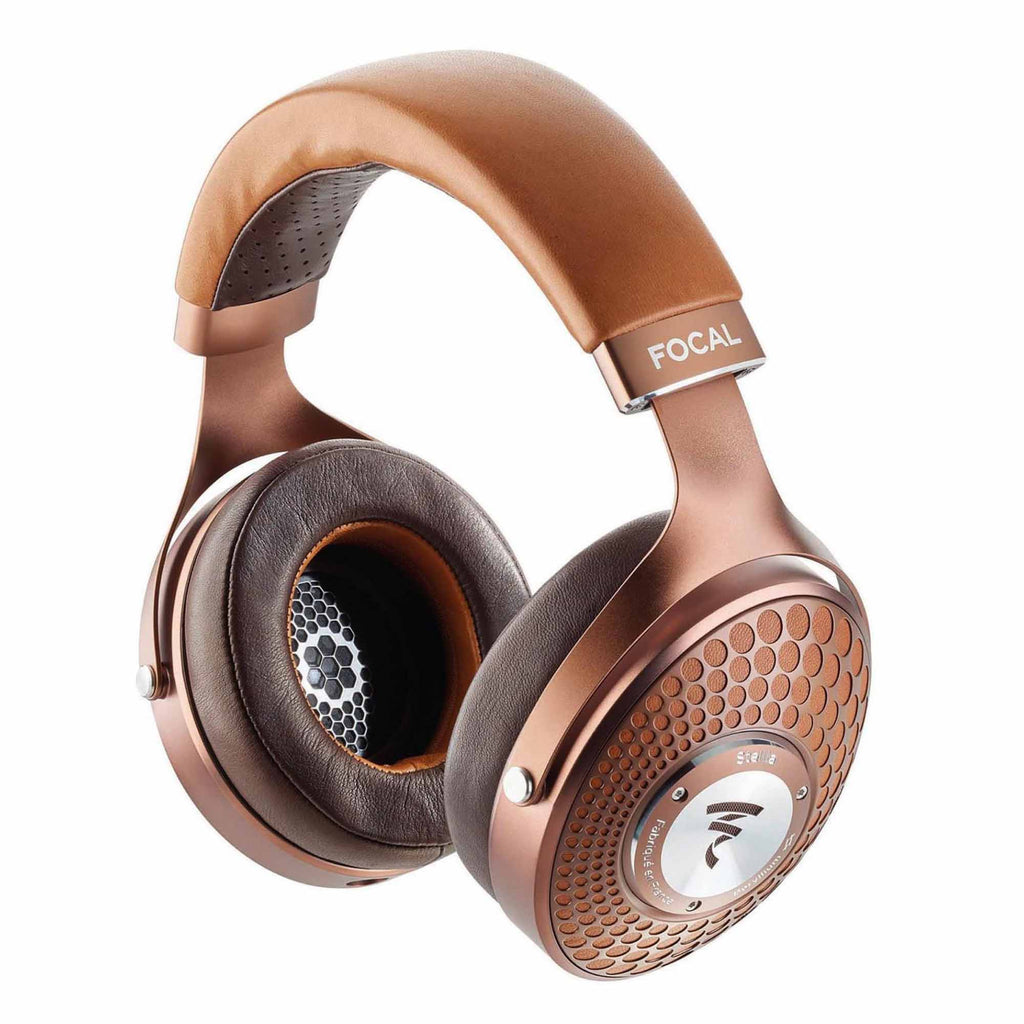 Focal Stellia Closed-Back Dynamic Headphones with brown leather headband and detailed honeycomb ear cup design on white background
