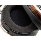 Close-up of the ear pad and wood finish on the HIFIMAN Susvara Open-Back Planar Magnetic Headphones