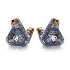 Campfire Trifecta 'Astral Plane' - Flagship IEM with transparent blue shells and gold accents shown on white background