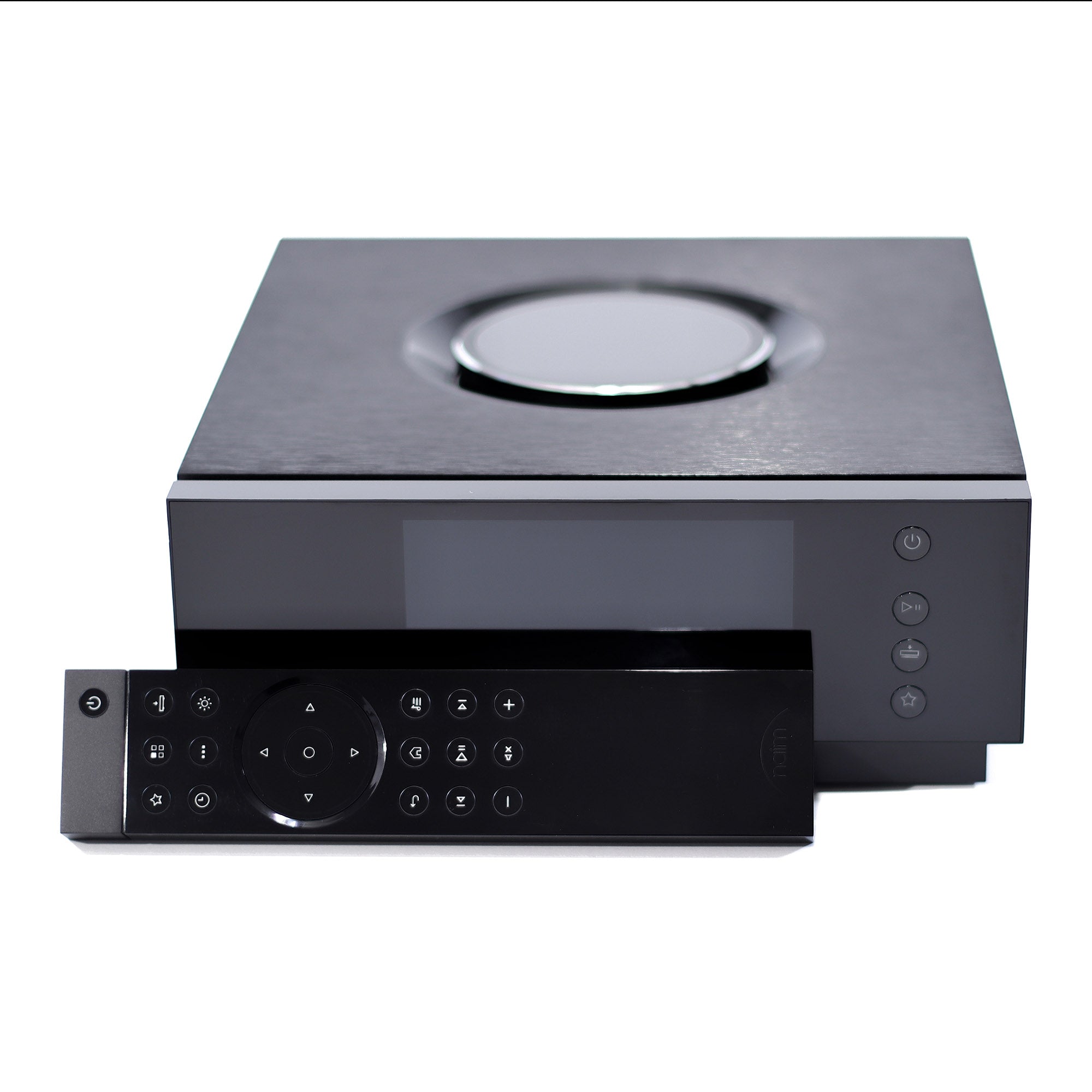 NAIM Uniti Atom All-in-one Wireless Music Player with circular volume dial and black remote control on white background