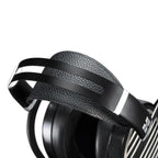 Close-up of black HIFIMAN Ananda Stealth Edition planar magnetic headphones with leather headband and ear cushions