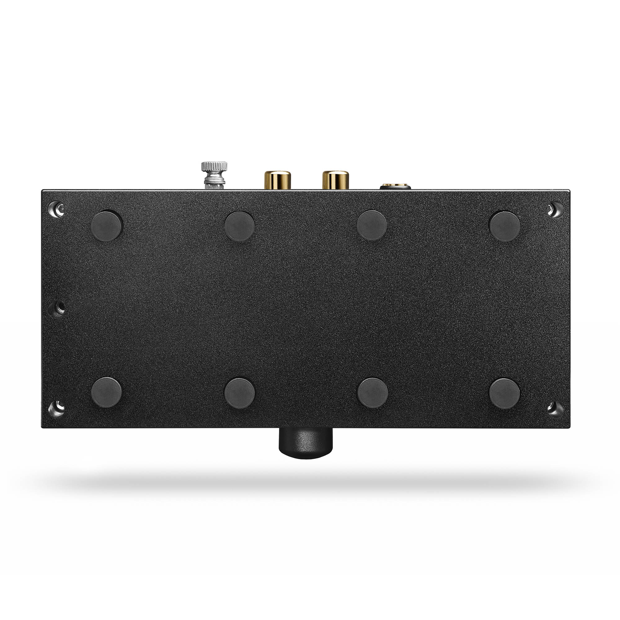 Bottom view of the Chord Anni Desktop Amplifier showing rubber feet and rear audio connectors on white background