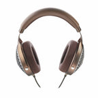 Focal Clear MG Open-Back Headphone with brown cushioned ear pads and honeycomb grille on white background