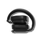 Folded Campfire Cascade closed back headphones with black leather ear pads and headband on white background