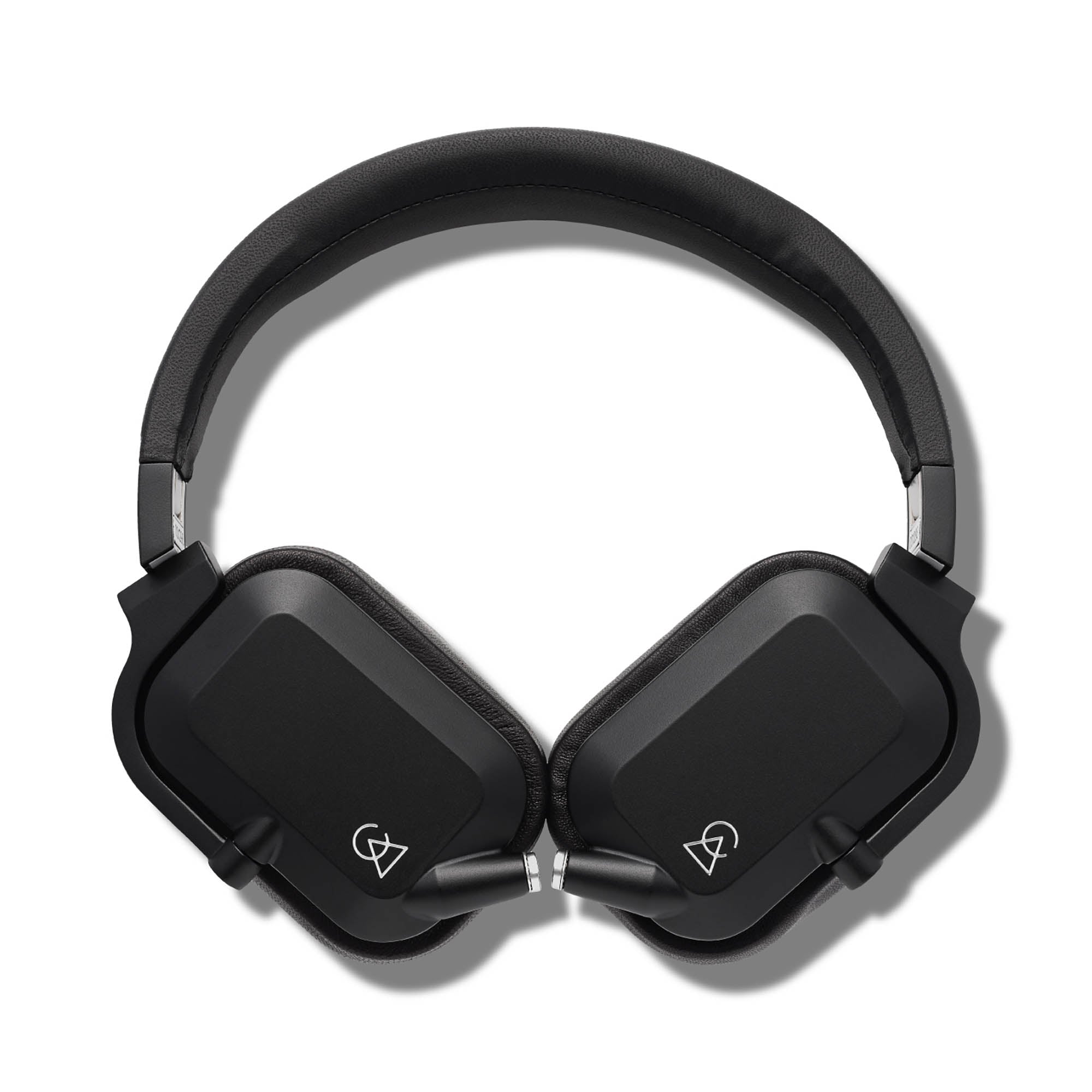 Top view of Campfire Cascade closed-back headphones with black aluminum and stainless steel chassis on white background