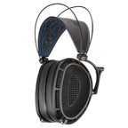Dan Clark Audio Expanse open-back planar magnetic headphones with black ear cups and blue stitched leather headband side view