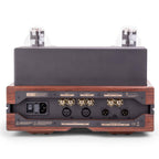 Rear view of Feliks Audio Envy Tube Headphone Amplifier showing input and output connectors on wood-accented chassis