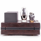 Front view of Feliks Audio Envy Tube Headphone Amplifier with visible vacuum tubes and wood finish chassis on white background