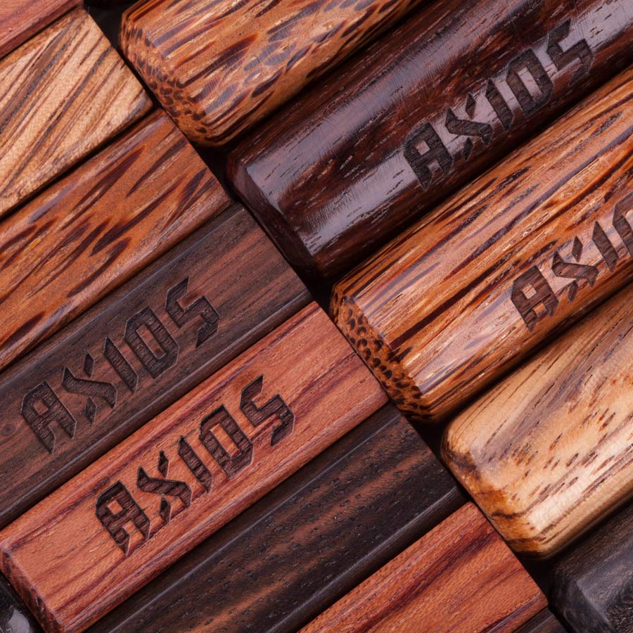 Close-up of wooden connectors engraved with Axios on Kimber Kable Axios Copper Headphone Cable handles