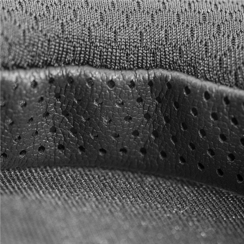 Close-up of perforated leather material on HIFIMAN Pali Pads ear pads for enhanced comfort and durability