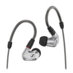 Sennheiser IE900 In-Ear Monitors with silver aluminum housing and black ear tips isolated on white background