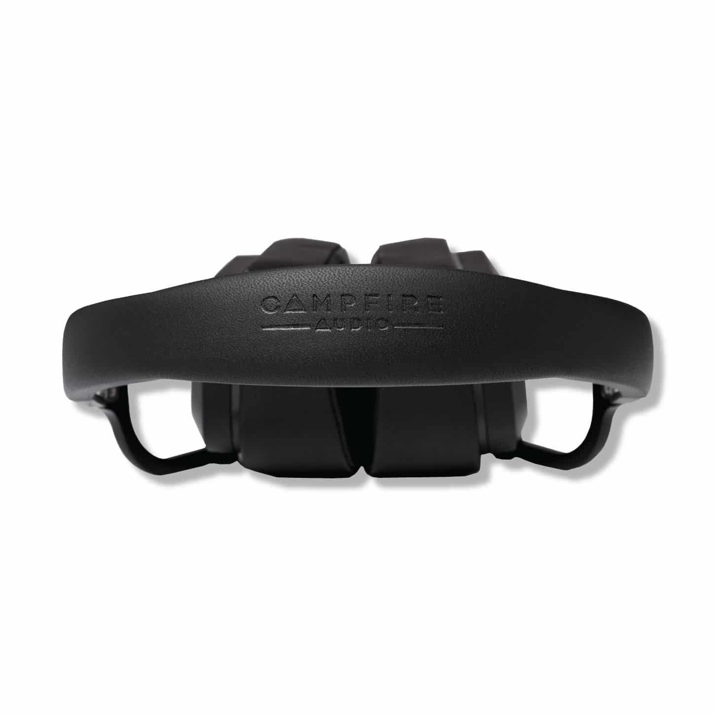 Top view of black Campfire Cascade closed back headphones with padded headband and embossed logo on white background