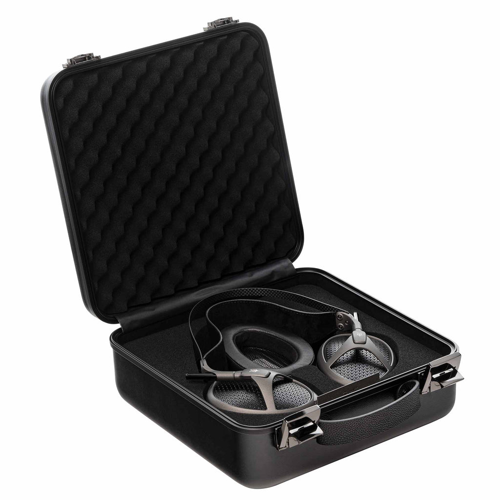 Meze Elite open back headphones displayed inside a black protective carrying case with foam padding