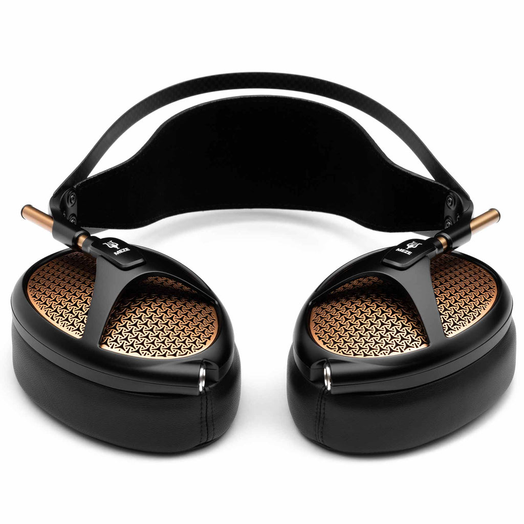 Meze Empyrean open-back headphones with black frame and distinctive copper grille pattern on white background