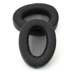 Pair of black Meze Elite / Empyrean Earpads with oval shape and mesh inner lining on white background