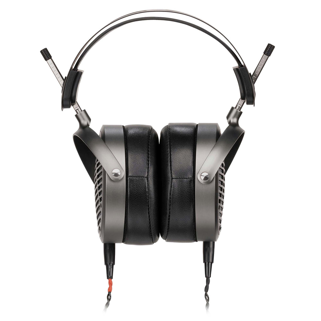 Front view of Audeze MM-500 open back planar magnetic headphones with thick black ear pads and metal frame on white background