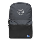 Front view of HeadAmp Embroidered Champion Backpack in gray and black with embroidered logos and zippered front pocket