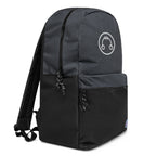 HeadAmp Embroidered Champion Backpack in black and gray with front pocket and embroidered logo on white background