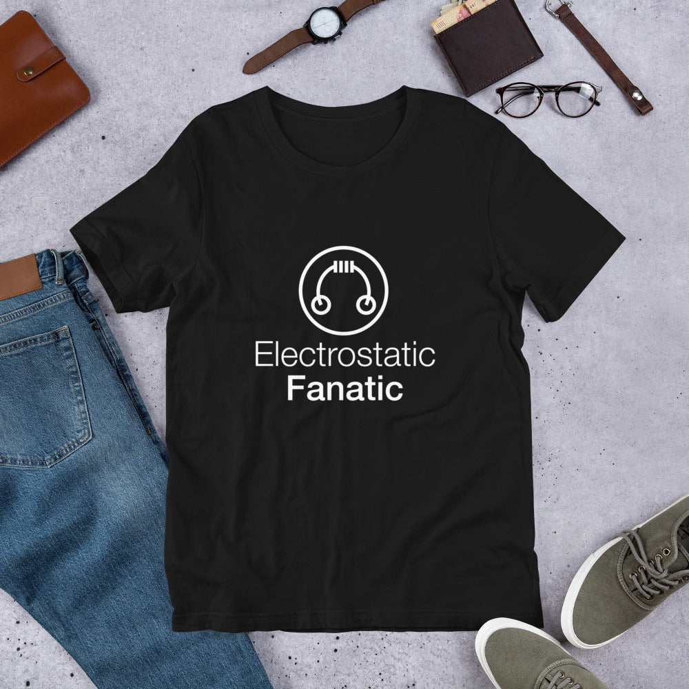 HeadAmp Electrostatic Fanatic T-Shirt in black laid flat with casual accessories on a gray concrete background