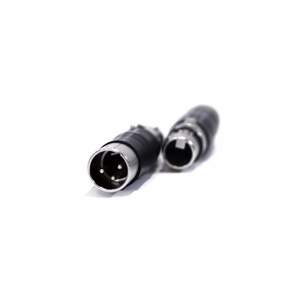 Close-up of RAAL-requisite Open-Baffle Compensation Barrels for SR1 with balanced XLR connector on white background