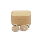 Campfire Orbit | True Wireless Earphones in beige with charging case on white background close-up view
