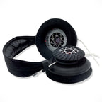 Spirit Torino Pulsar Aluminum open-back dynamic headphones with black ear pads and detailed driver design on white background