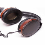 Sennheiser Orpheus HE90 / HEV90 electrostatic headphones with wooden ear cups and black mesh on white background