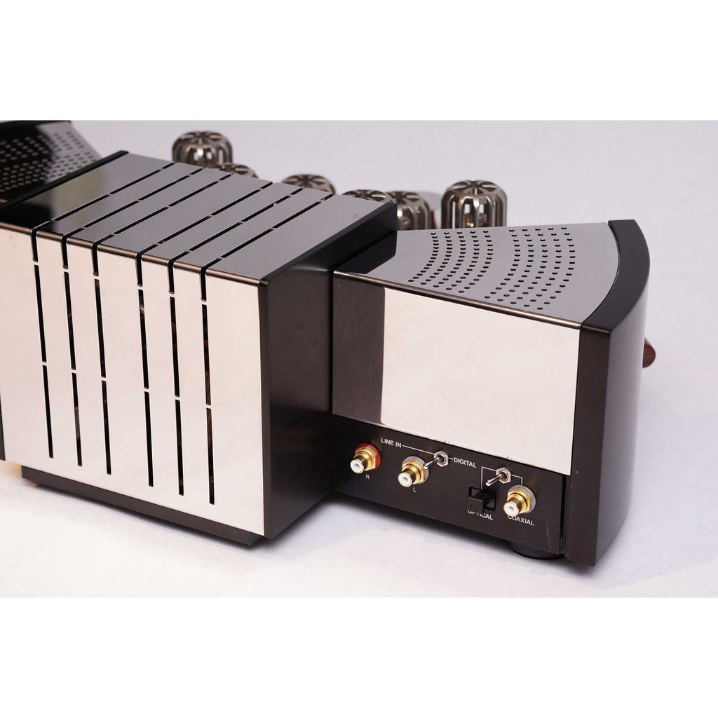 Close-up of the Sennheiser Orpheus HE90 / HEV90 vacuum tube amplifier with polished metal casing and input connectors