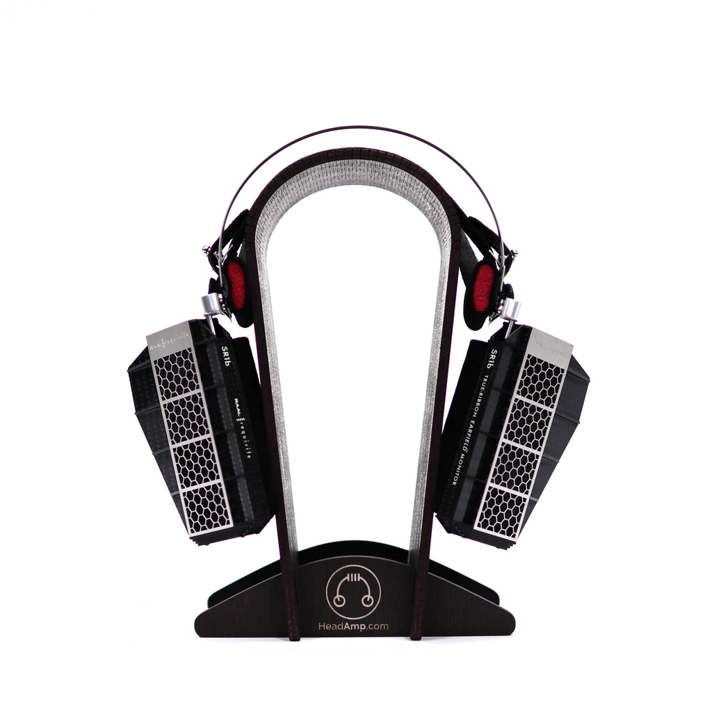 RAAL-requisite SR1b Ribbon Headphone on wooden stand showing open-back design and headband details on white background