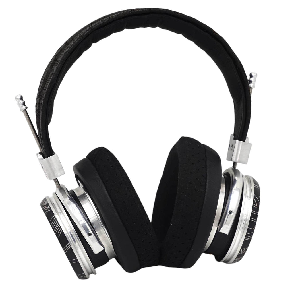 Spirit Torino Super Leggera 1706 open-back headphones with silver metal frame and plush black ear pads on white background