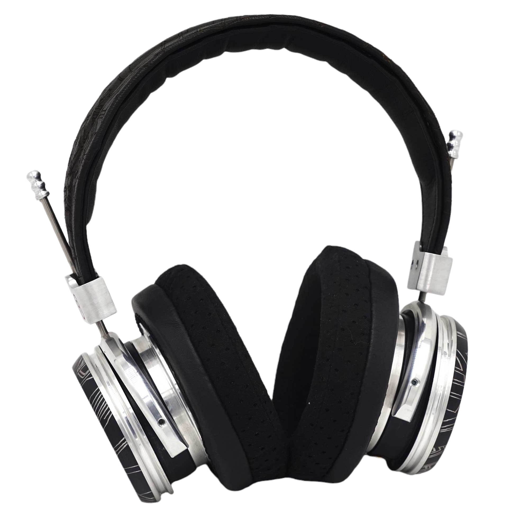 Spirit Torino Super Leggera 1706 open-back headphones with silver metal frame and plush black ear pads on white background