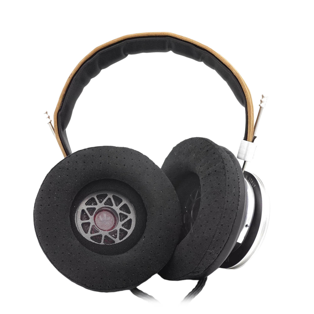 Spirit Torino Twin Pulse open back dynamic headphones with black ear pads and silver and tan headband on white background