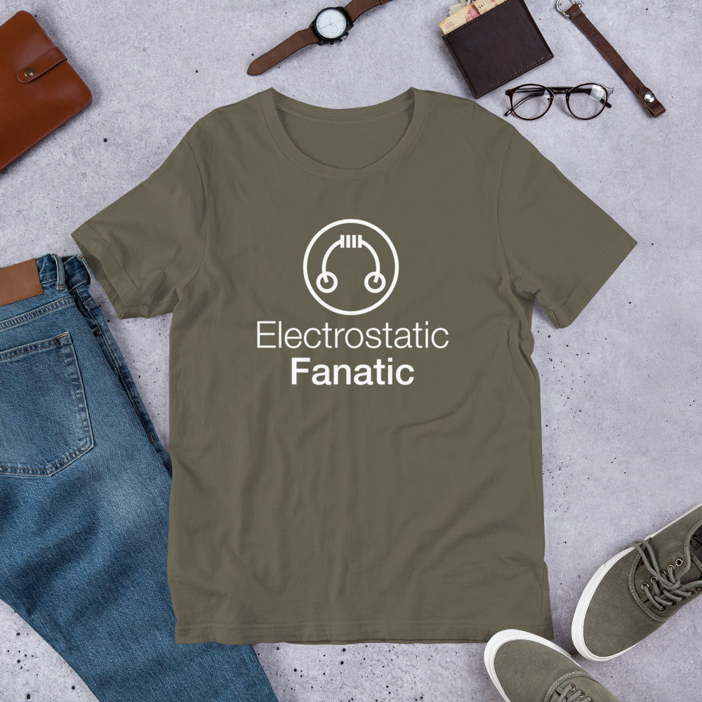 Flat lay of olive green HeadAmp Electrostatic Fanatic T-Shirt with white graphic, styled with casual accessories on gray surface