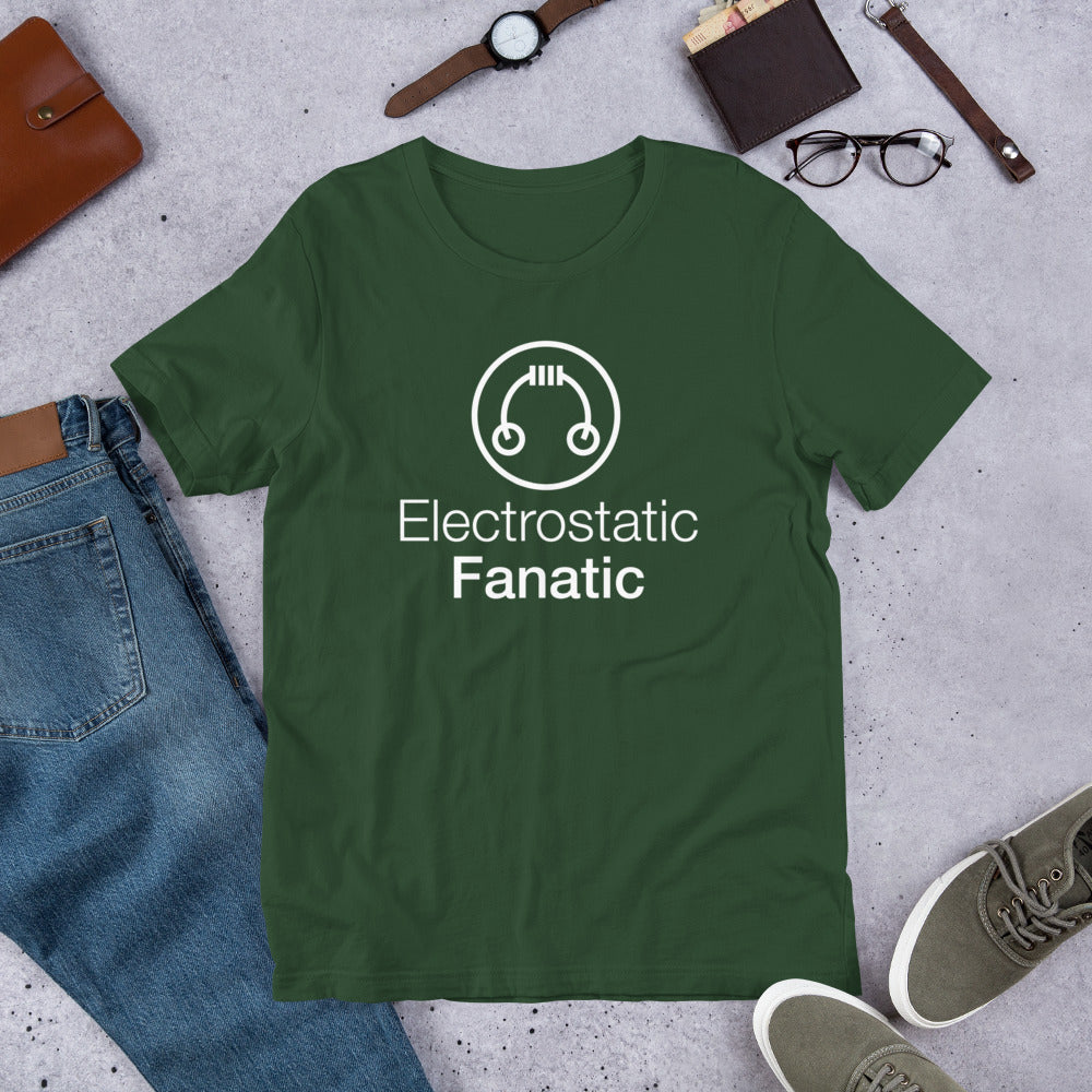 HeadAmp Electrostatic Fanatic T-Shirt in green with white print laid flat with casual accessories and denim jeans