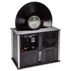 Audio Desk Vinyl Cleaner Pro X with vinyl record inserted, black control panel, and cooling fan on white background