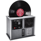 Audio Desk Vinyl Cleaner Pro X with black control panel and spinning fan cleaning a vinyl record with red label