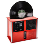Audio Desk Vinyl Cleaner Pro X with black vinyl record inserted in bright red cleaning machine on white background