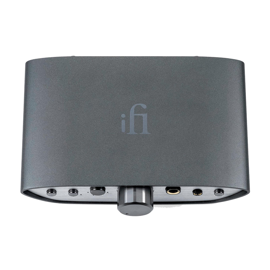 Top view of the iFi Audio ZEN CAN Balanced Headphone Amp with volume knob and input jacks visible on white background