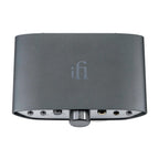 Top view of the iFi Audio ZEN CAN Balanced Headphone Amp with volume knob and input jacks visible on white background